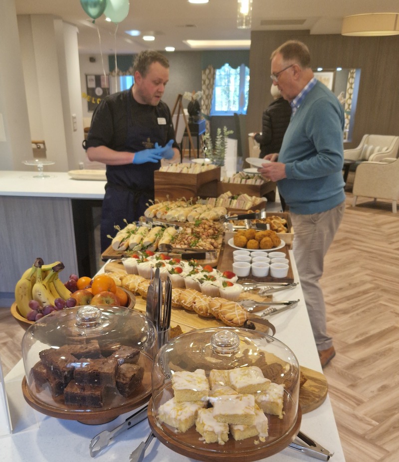 chef giving visitors snacks