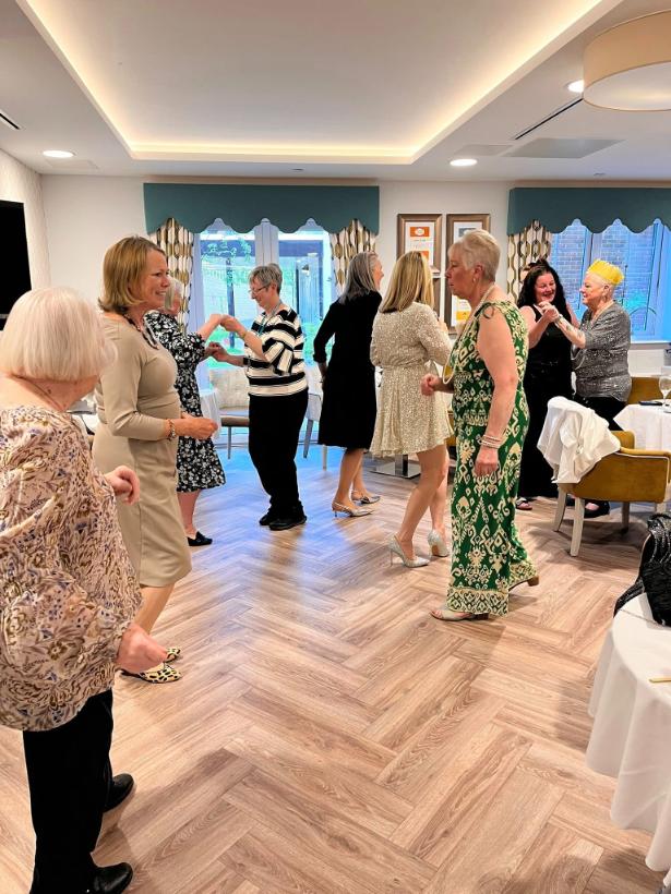 people standing in a hall