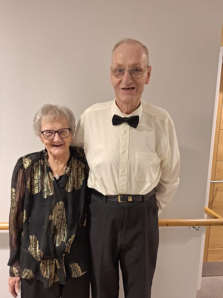 peggy and graham stood together smiling