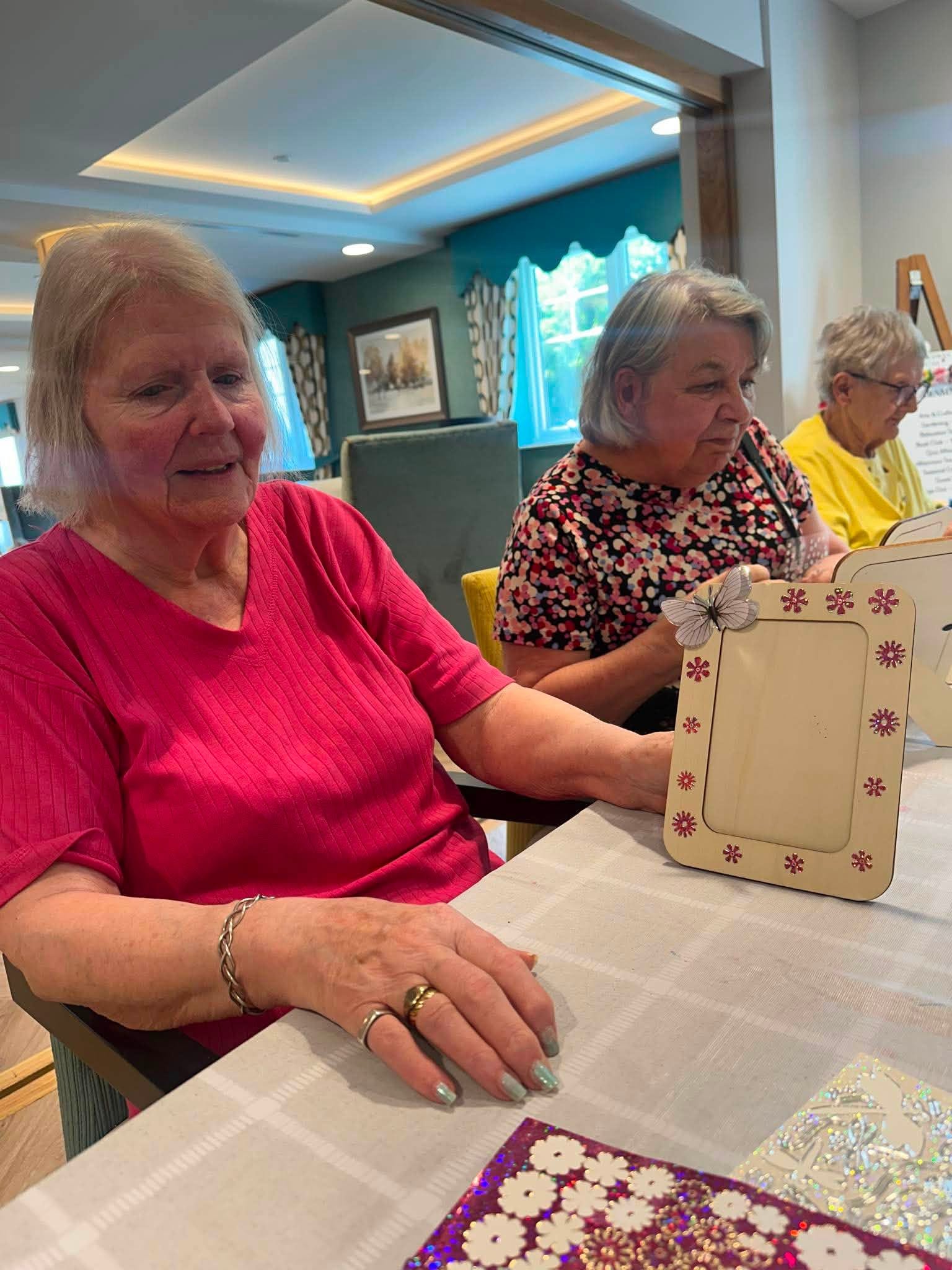 older ladies doing arts and crafts